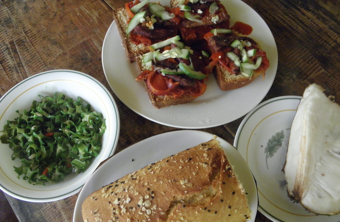 Sunday lunch is salted duck breast pizza, winged beans, soursop and homemade bread.